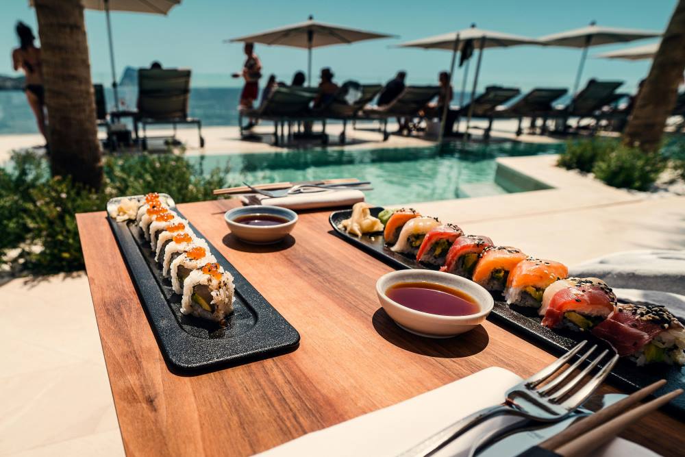Sushi Roll on Tray and Table at a poolside bar in Spain