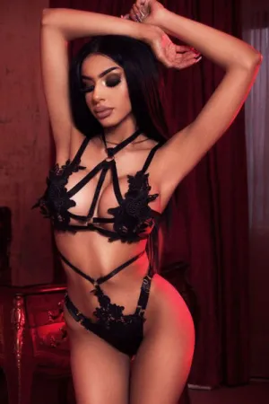 Leila looking busty in a black bra and panties